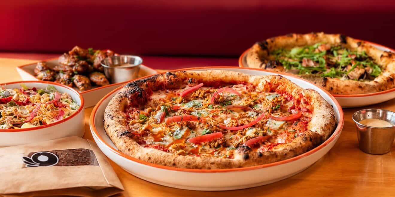 Pizzaclub's Mexican pizza with pulled chicken, peppers and aji verde