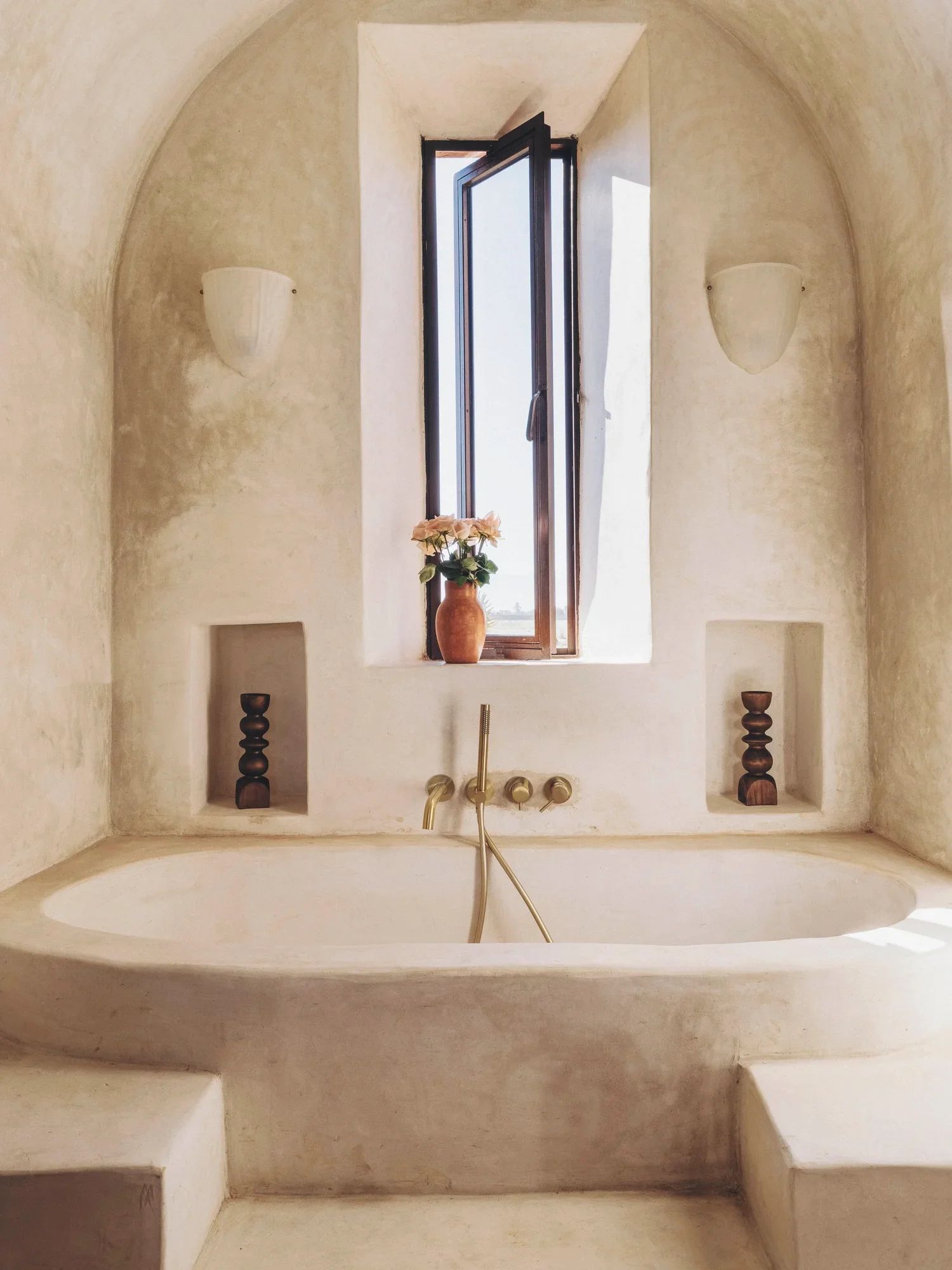 The bathtub set under the suite's dome