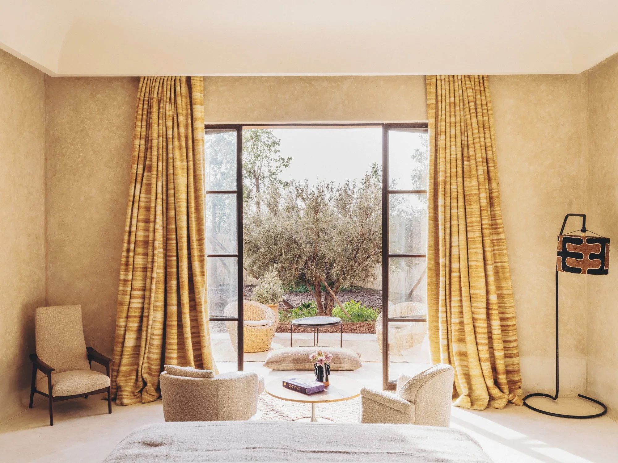 The Private Garden Suite opens onto its own enclosed plot of olive trees
